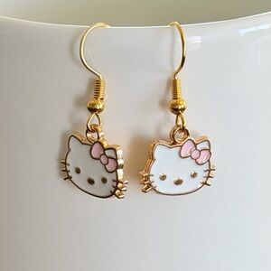 Hello Kitty Gold Tone Earrings with White Faces and Pink Bows